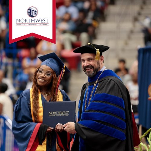 NWCC graduate receiving diploma during commencement ceremony