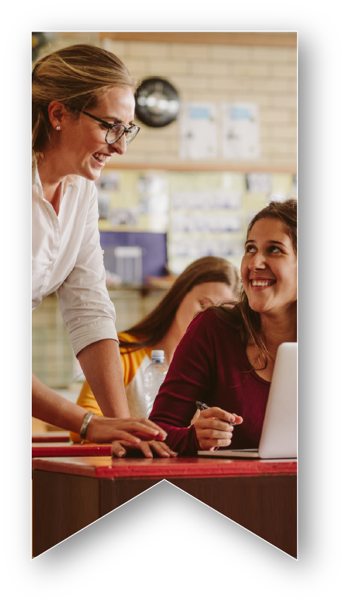 Hero-images-ACUE-center-new-2 Higher education Instructor in classroom with student
