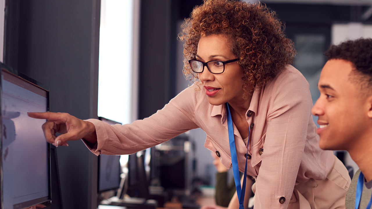 College professor teaching students how to use AI ethically