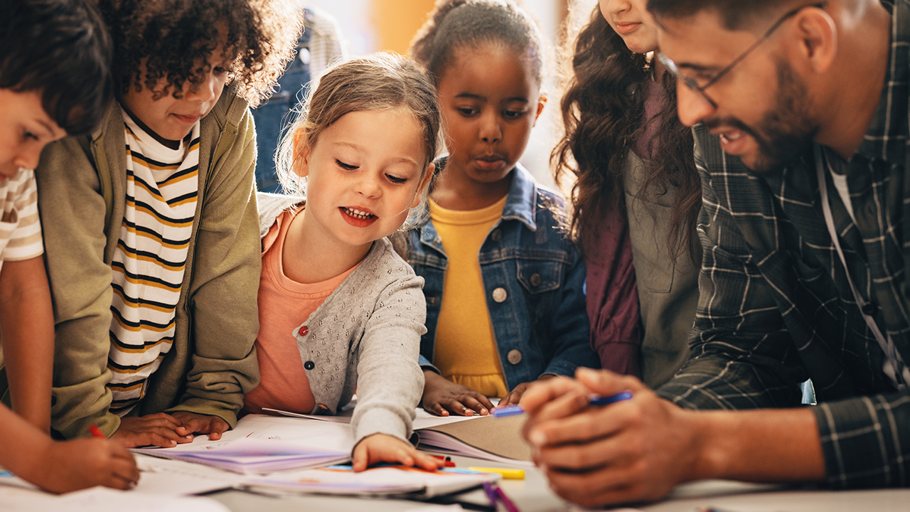 k-12 students learning from teacher part of CSCU and ACUE teaching excellence program