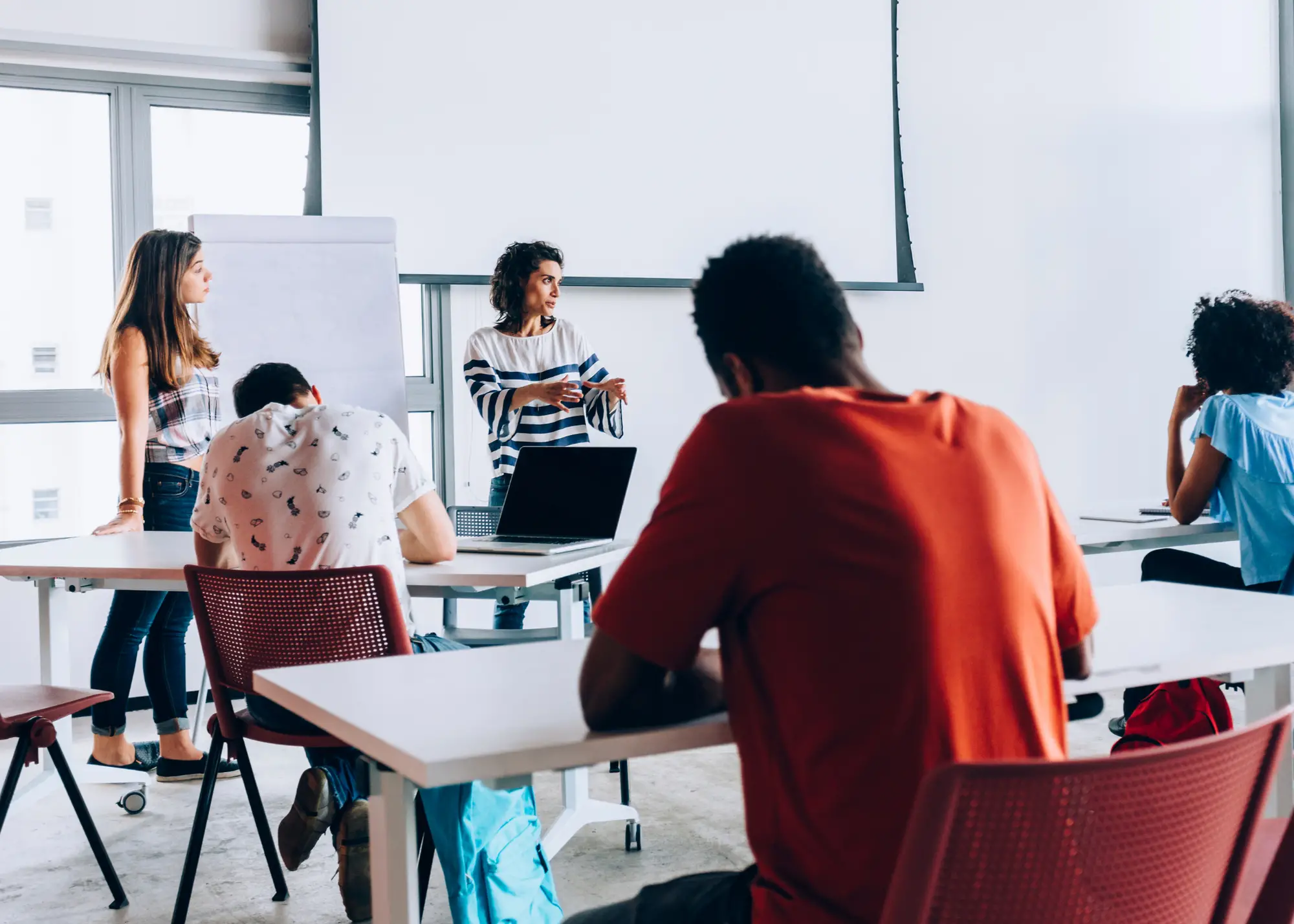 Teacher engaging in deliberative dialogue